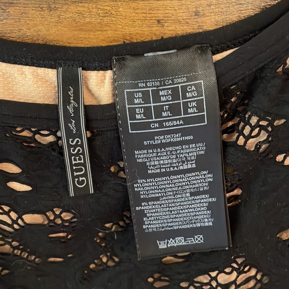 Black stretchy dress with nude layer of material. - Picture 2 of 3